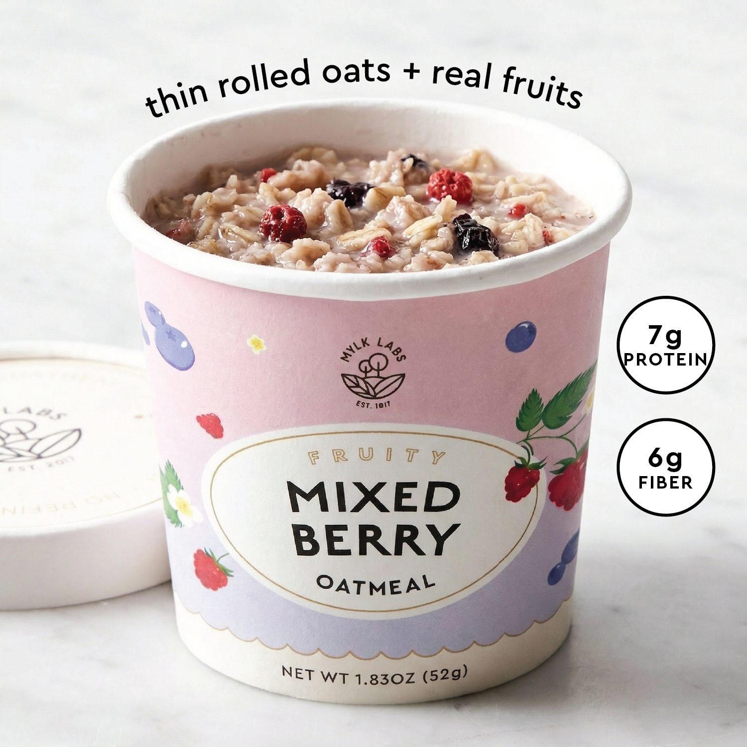 Container of mixed berry oatmeal with nutritional information on a white background