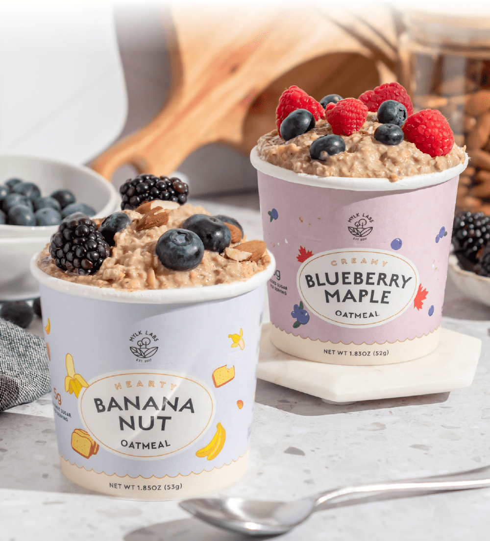 two oatmeal cups with fruit