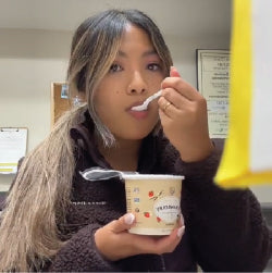 woman eating mylk labs oatmeal