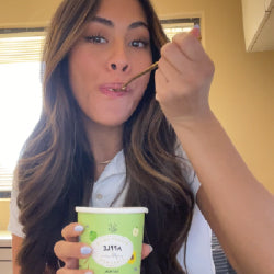 woman eating mylk labs oatmeal