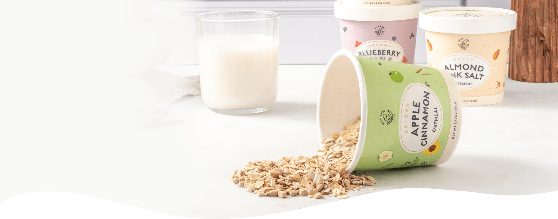 apple cinnamon oatmeal spilling out of cup