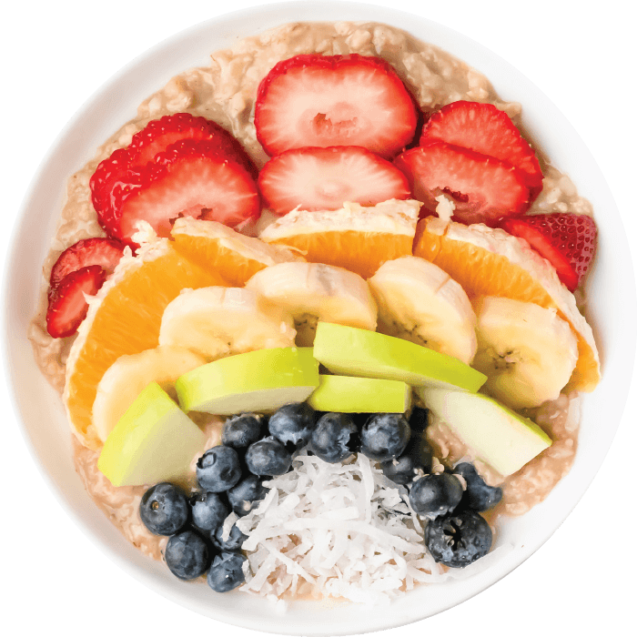 A bowl of oatmeal with fruit